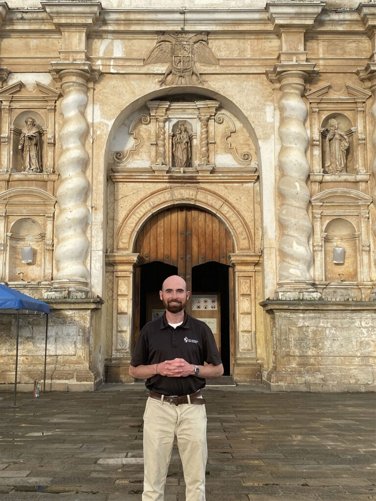 Alex Kulik in Front of Church