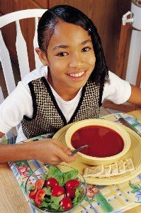 Photo: child eating soup